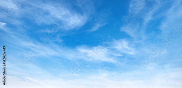 Obraz blue sky with white clouds