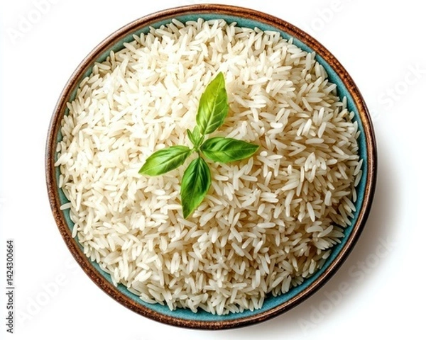 Obraz Rice bowl with basil garnish on a white background