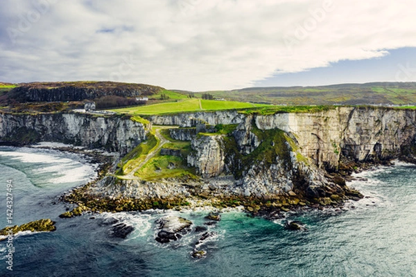 Obraz Larrybane Quarry from Above – Aerial View of Northern Ireland’s Dramatic Limestone Cliffs and Clear Calm Sea	