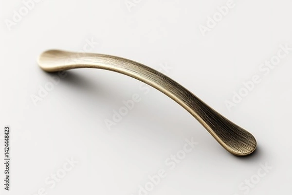 Fototapeta Elegant brass drawer handle resting on a smooth surface, showcasing its refined design and texture for a contemporary home aesthetic