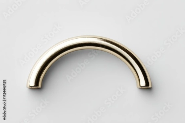 Fototapeta Golden curved handle on white background showcasing modern design and elegance for home decor