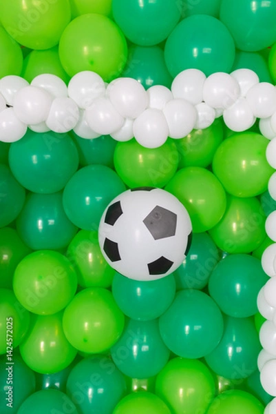 Fototapeta soccer ball on green background