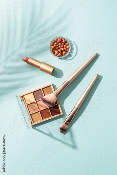 Obraz Make up products on blue background.