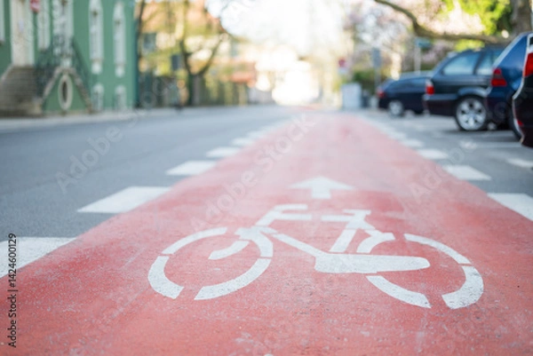 Fototapeta marking sign on asphalt on the road on a bicycle path