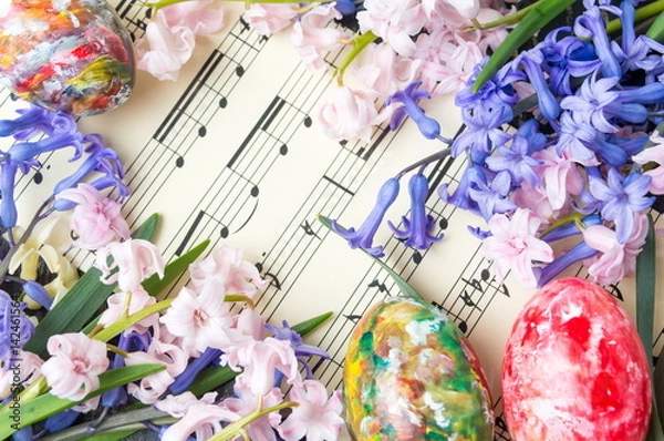 Obraz Easter eggs and hyacinth flowers on music sheets