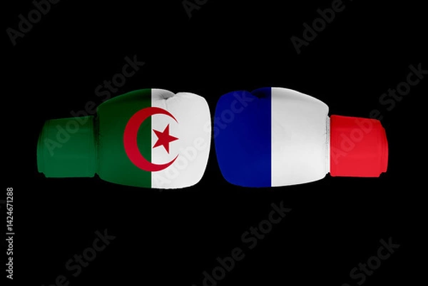 Fototapeta Boxing gloves with Algerian and French flags facing each other symbolizing a fight confrontation, rivalry or diplomatic tension, isolated on a black background.