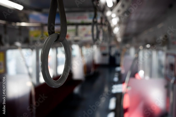 Obraz Passenger hanging strap and ring on the train
