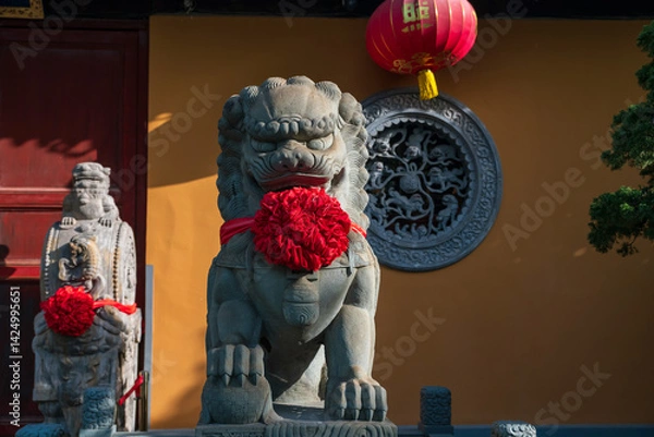 Fototapeta Chinese Imperial guardian lion at Longhua temple in Shanghai