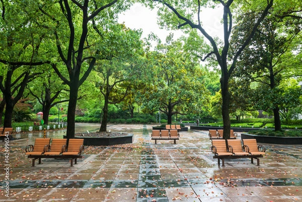 Fototapeta Chairs at People's square city park after raining in Shanghai, China