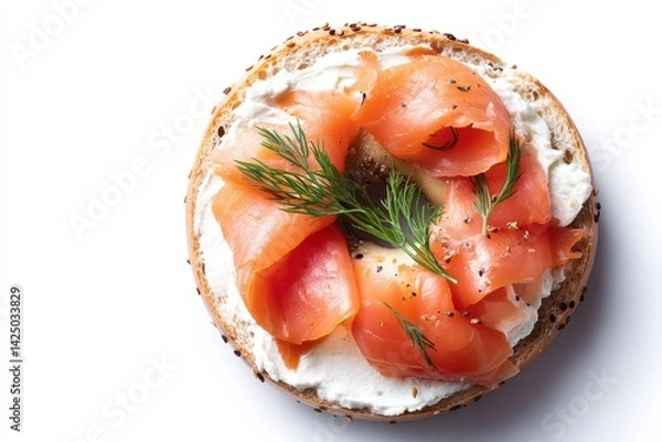 Fototapeta Delicious bagel with fresh cream cheese lox and dill herb served on a white isolated background for healthy breakfast