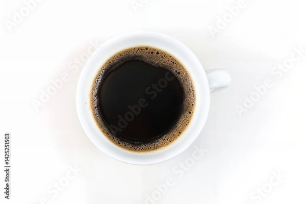 Obraz The image shows a close-up of a white coffee cup filled with black coffee, viewed from above