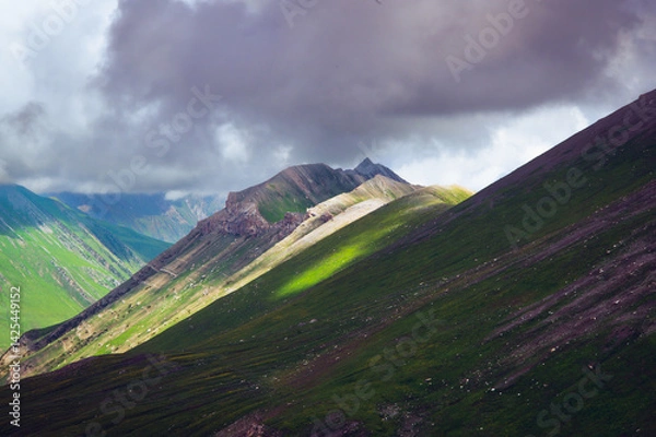 Obraz Clouds over the mountain. Panoramic view from the top of Sonmarg, Kashmir valley in the Himalayan region. Serene meadows, alpine trees, wildflowers on the trails of thGreat Lake of Kashmir Trek, 2022	