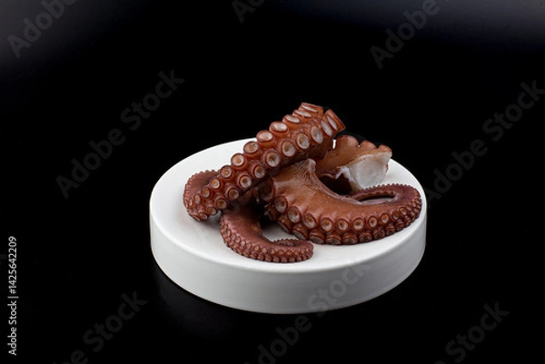 Obraz boiled octopus on a plate.