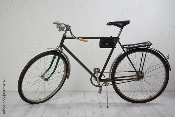 Fototapeta Old bike on white