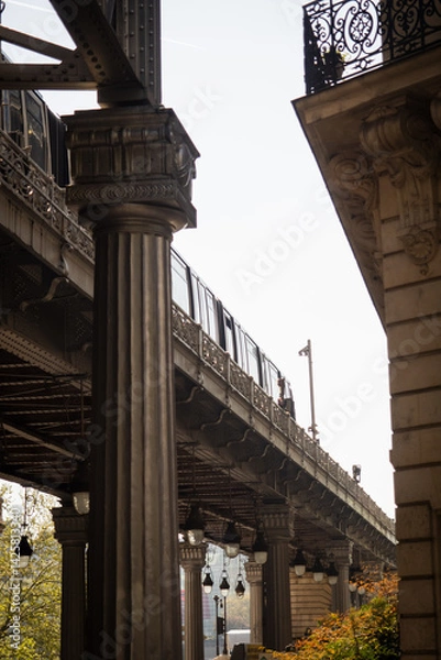 Fototapeta Dreamy spring Eiffel Tower from the metro bridge Bir Hakeim - Paris