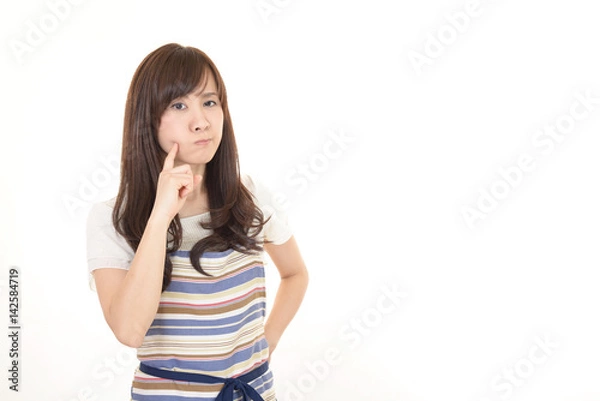 Fototapeta 不安そうな表情の主婦