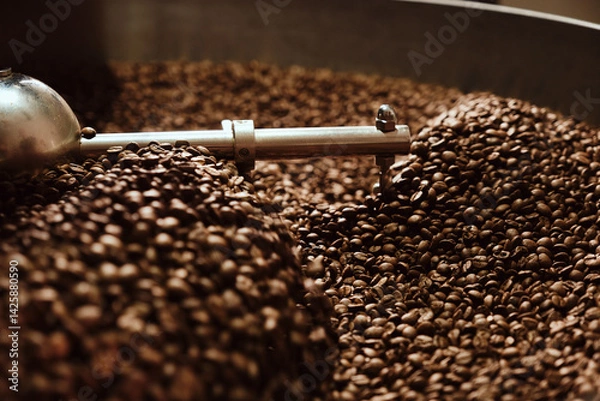 Fototapeta Roasting coffee beans in the machine