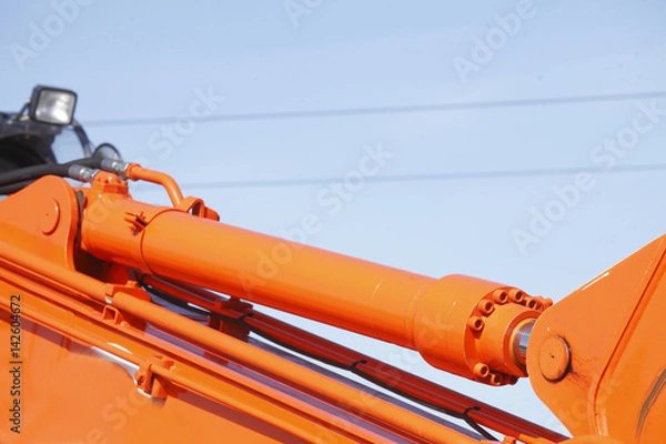 Fototapeta Hydraulischer Baggerarm eines Baggers