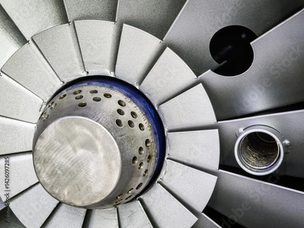 Fototapeta Close-up view of an aircraft engine turbine showcasing intricate design and engineering details