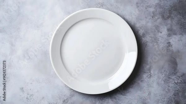 Fototapeta Empty Elegant White Ceramic Plate Ready for Food Presentation on Gray Background