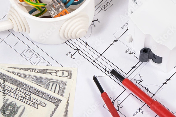 Obraz Electrical components using in electric installations, construction diagrams, work tools and dollar banknotes. Planning build or buy house