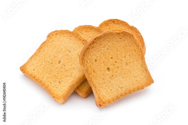 Fototapeta Slices of toast bread on wooden table, top view.