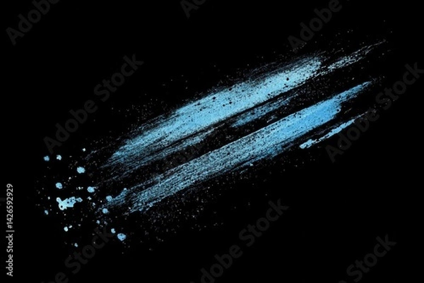 Fototapeta Abstract brushstroke with light blue color accents and splatters on a black background