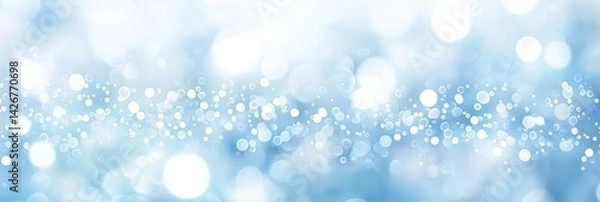 Obraz Sparkling snowflakes gracefully fall against a vivid blue backdrop.