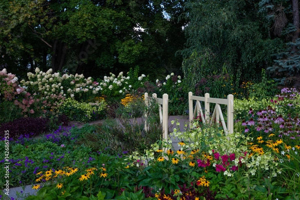 Obraz Serene Garden Path with Bridge Surrounded by Flowers