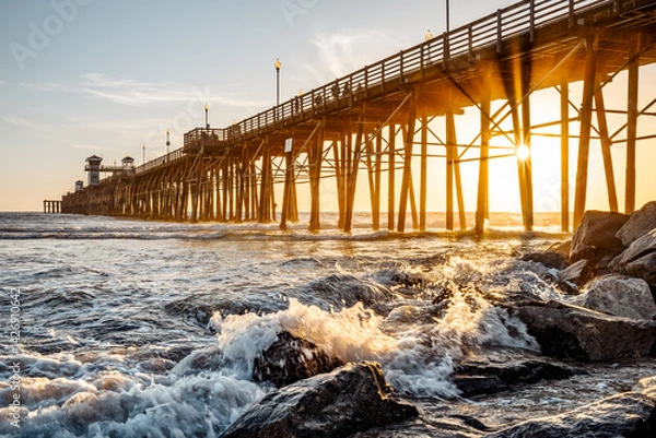 Obraz the famous oceanside pier during sunset, california