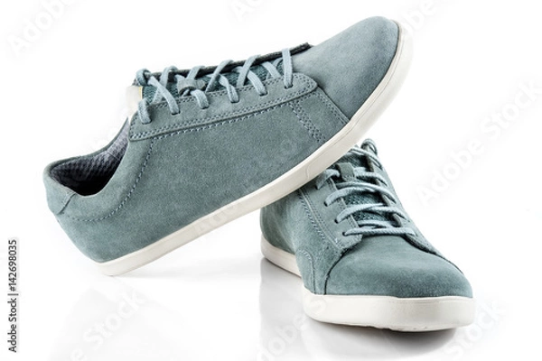Fototapeta Pair of man's shoes front view. Suede sneakers isolated on white background.