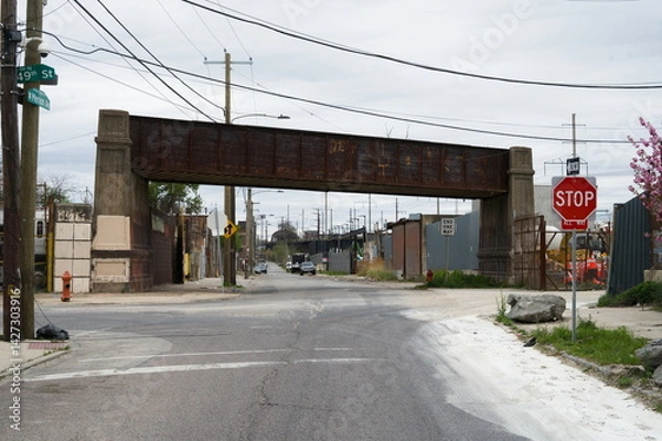 Fototapeta Abandoned Railroad bridge in West Philadelphia on Merion Avenue