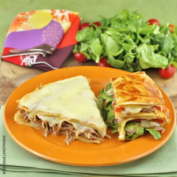 Fototapeta Plate of sandwich accompanied by salad in the background representing a quick and nutritious meal ideal for busy lives