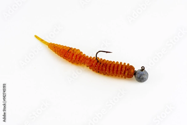 Obraz Exhibition of pirated copies of fishing metal spoon baits. Bait for fishing in the shape of a spoon with a hook on a white background
