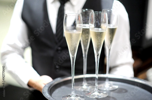 Obraz Professional serving champagne