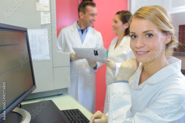 Fototapeta Medical worker using computer