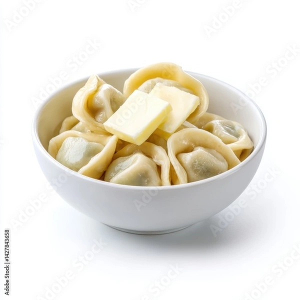 Fototapeta Dumplings (pelmeni) topped with a pat of butter, served in a plain white bowl, isolated on pure white background