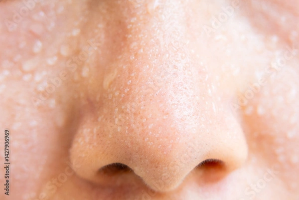 Obraz Close-up of a woman's face sweating in the hot summer