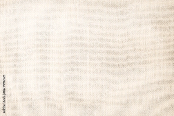 Fototapeta Brown sackcloth woven texture background in natural pattern. Jute hessian burlap, linen background in light beige cream color blank. Weaving canvas fiber line cotton cloth textured as organic.