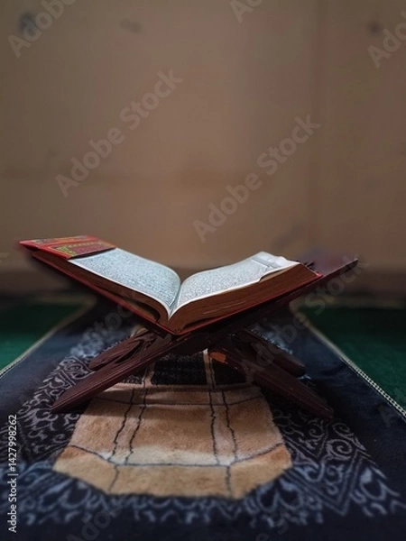 Fototapeta a Muslim holy book is open on the shelf where the Al-Quran is placed