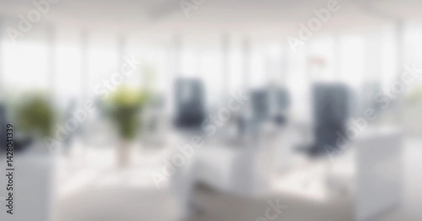 Fototapeta Bright office interior with desks chairs computers and plants blurred background.