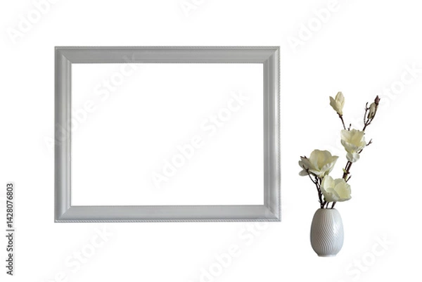 Fototapeta white frame and magnolia flowers in a vase isolated on white background. interior decor