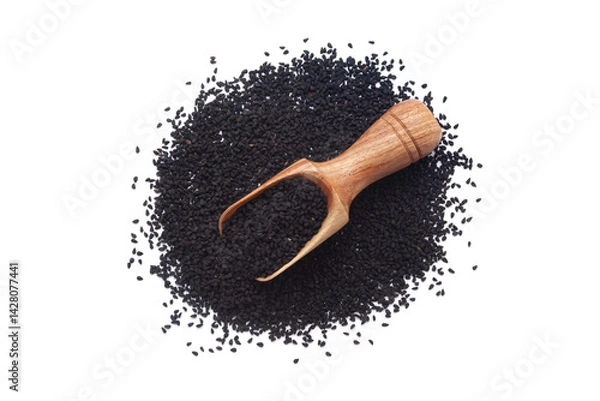 Obraz A wooden scoop filled with organic Black Cumin (Nigella sativa) or kalonji, placed on a heap of nigella seeds, isolated on a white background.
