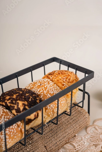 Obraz Some Soft Breads With Various Flavors Look Very Neat. Looks Very Aesthetic And Appetizing.