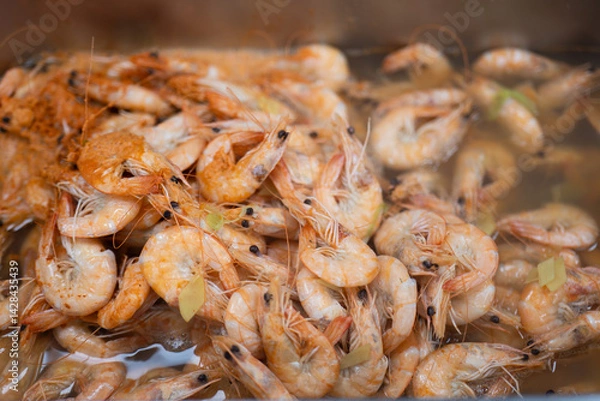 Obraz Cooked Shrimp in Hot Broth with Herbs and Steam Rising