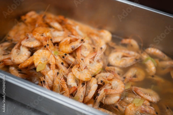 Obraz Cooked Shrimp in Hot Broth with Herbs and Steam Rising