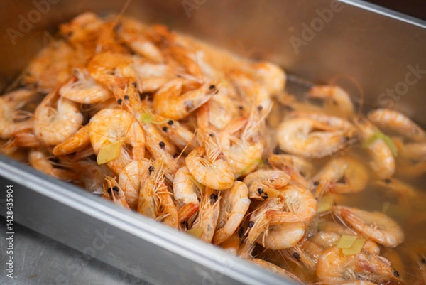 Obraz Cooked Shrimp in Hot Broth with Herbs and Steam Rising