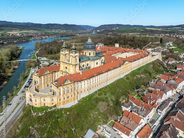 Fototapeta Benedictine abbey in Melk, Austria. Aerial view with Danube River