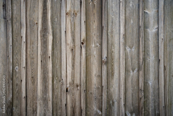 Fototapeta Gray weathered wall made of wooden planks. Weathered wooden background. Top view with space for text.