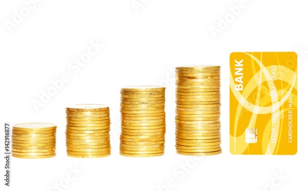Fototapeta columns of gold coins and golden credit card isolated on white background